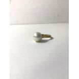 A gold ring with cultured pearl setting, ring marked 9ct, size J, weighs 2.95 grammes