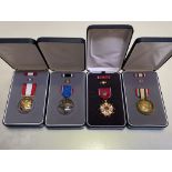 United States of America. Four cased medals including a Distinguished Flying Cross, Distinguished