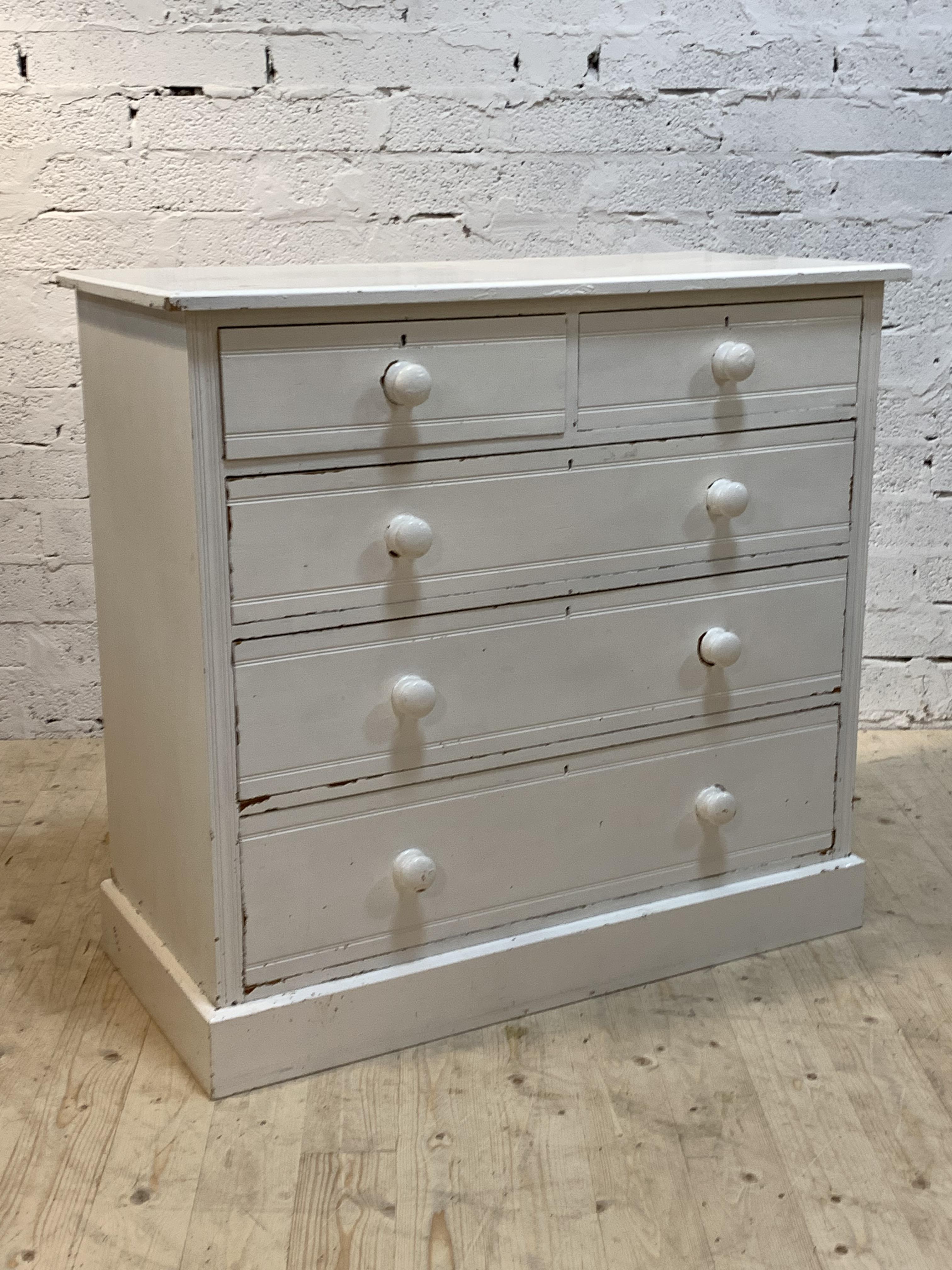 An Edwardian painted pine chest, with two over three drawers raised on plinth base, H100cm,