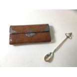 A silver spoon, made by Sheana Stephen (13cm) and a crocodile skin silver mounted purse (2)
