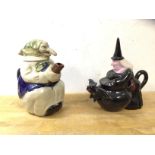 Two novelty china teapots in the form of witches, one by Richard Parrington, (20cm h) (2)