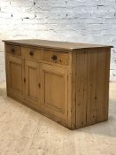 A late 19th century and later pine sideboard, the rectangular top over three drawers and three