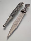 Islamic kindjal dagger, the handle and scabbard in metal with filigree style decoration, straight