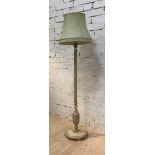A cream painted standard light of classical design, with reeded column on a circular base, H187cm
