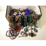 A quantity of jewellery including a lapis lazuli bead necklace, other bead necklaces include