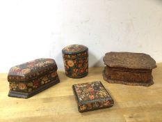 A group of three early 20thc Indian papier mache boxes, (tallest 10cm h), a poker work box (4)