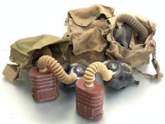 WWII British respirators, mixed dates, several in original canvas bags (5)