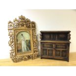 A novelty miniature court cupboard, the top tier hinged with music box to interior, over recess to