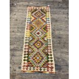 A Chobi kilim runner rug, of all over geometric design, 190cm x 65cm