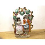 A 19thc Staffordshire figure Fortune Teller, (30cm h)