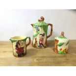 A 1920's / 30's Wade Heath Walt Disney Seven Dwarves coffee pot, milk jug and jam pot, (20cm h)