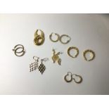 Five pairs of hoop style earrings marked 9ct, a pair of open worked diamond shaped earrings, a