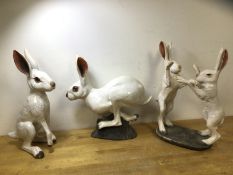 A collection of ceramic hares, one with initials BA to base (?), (tallest 36cm h)