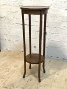 An Edwardian inlaid mahogany jardiniere stand, the circular top over boxwood strung square tapered