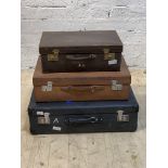A collection of three suitcases