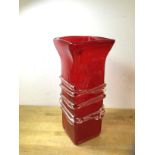 A Whitefriars style vase, red vase with flared rim of square form, with clear glass naturalistic
