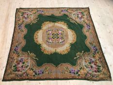 An Edwardian chenille table cloth with central floral medallion with floral spandrels, (150cm x