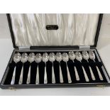 A boxed set of 12 silver coffee spoons, Sheffield 1962, in box bearing label Alexander Scott,