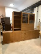 A Danish mid century teak sectional sideboard display cabinet, the top with open shelves, glazed