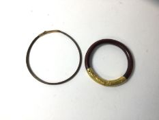 19thc treen bracelet, one with yellow metal clasp, (5.5cm diameter) a treen ring with yellow metal