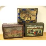A group of three German gingerbread tins, all with scenes of Nurenburg to top (18cm x 42cm x
