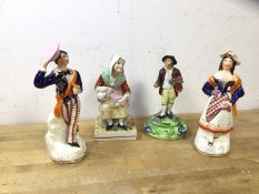A group of Staffordshire figures including old woman pouring from jug into cup, (16cm h), a courting