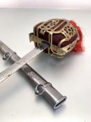 A Scottish brass hilted basket sword (modern construction) the brass hilt with felt liner and