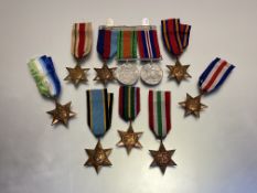British stars and medals. 1939-45 Star, Defence medal and War medal, swing mounted. Atlantic Star.