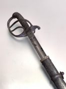 A Victorian steel pattern sword, the steel guard with sharkskin grip, single fullered etched black