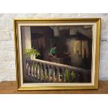 David Rylance, Woman doing laundry on balcony, oil, signed bottom left, paper label verso, (50cm x