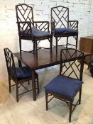 A set of eight faux bamboo cock pen style dining chairs, with blue squab seat cushions, including