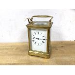 A late 19th early 20thc four glass carriage clock with roman chaptering, (18cm h including handle)