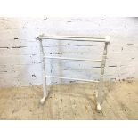 A white painted four rod towel rail (84cm x 72cm x 27cm)