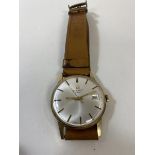 A Tissot gentleman's wrist watch marked 375 to interior, inscribed verso D Plant 1979, on tan
