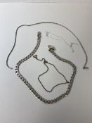 A collection of silver necklaces including a flatlink necklace, (49cm) weighs 63 grammes, and