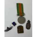 A WWII Defence Medal, a pendant with Royal lady in relief, inscribed Al Fante Sostegno, with a