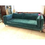 A contemporary four seater Sofa Workshop teal upholstered sofa of square frame with back side and