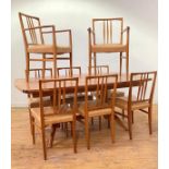 Gordon Russell (1882 - 1980) Broadway Works, A mid century teak extending dining table, the top with