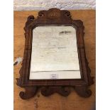 A 19thc wall mirror with walnut and mahogany frame and shell inlay to surmount, (45cm x 32cm)