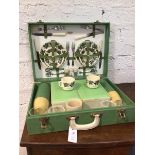 A vintage picnic basket complete with plates, cups, cutlery etc (15cm x 49cm x 35cm)