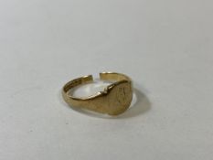 A 9ct gold signet ring, size q, weighs 2.29 grammes