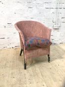 A vintage Lloyd Loom style chair with pink painted back and arms, drop in cushion (68cm x 55cm x