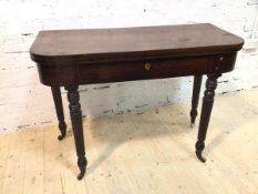 A William IV mahogany fold over d end side table the fold over top cross banded and with ebony inlay