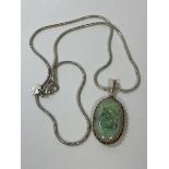 An opal pendant necklace, the oval opal in yellow metal mount on chain marked 925, (pendant - 3cm