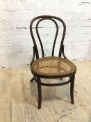 A late 19th early 20thc bentwood cafe chair with cane seat (79cm x 45cm x 48cm)