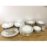 A Royal Doulton china Hampton Court pattern dinner service including 12 dinner plates (27cm d), 12