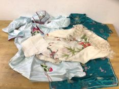 Two Chinese dresses, marked size 38, one with label Guo Su, a shawl and two placemats, (a lot)