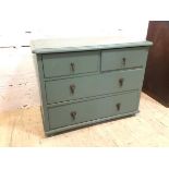 An early 20thc low chest of drawers with moulded rectangular top over two short drawers and two long