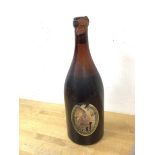 A Bass Princes Ale, inscribed verso Prince of Wales brew 1929, fill level to shoulder, (30cm h)