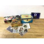 A mixed lot including vintage tins, (largest 11cm x 25cm x 19cm), an enamel house number sign,